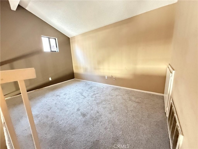 18122 Sundowner Way Unit 1108, Canyon Country, CA 91387 - additional living space featuring lofted ceiling, a textured ceiling, carpet, and baseboards