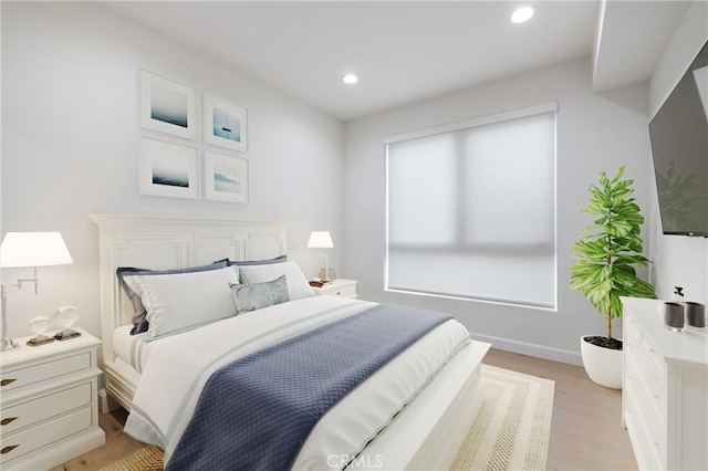bedroom featuring light wood-style floors, recessed lighting, and baseboards
