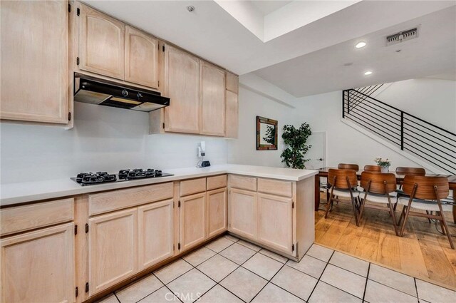 2461 Oneida St Unit B, Pasadena, CA 91107 - kitchen featuring light brown cabinets, under cabinet range hood, a peninsula, recessed lighting, and light countertops