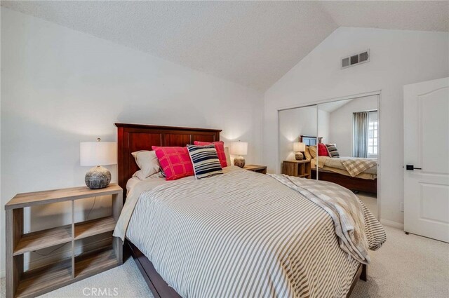 2461 Oneida St Unit B, Pasadena, CA 91107 - bedroom with lofted ceiling, light carpet, and a closet
