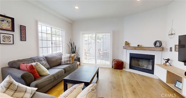 2461 Oneida St Unit B, Pasadena, CA 91107 - living area featuring a fireplace with flush hearth, light wood-style floors, and recessed lighting