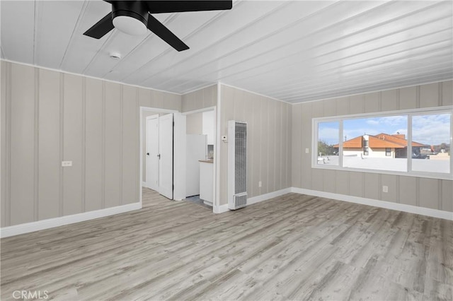 540 Avalon St, Morro Bay, CA 93442 - spare room featuring a heating unit, light wood finished floors, ceiling fan, and baseboards