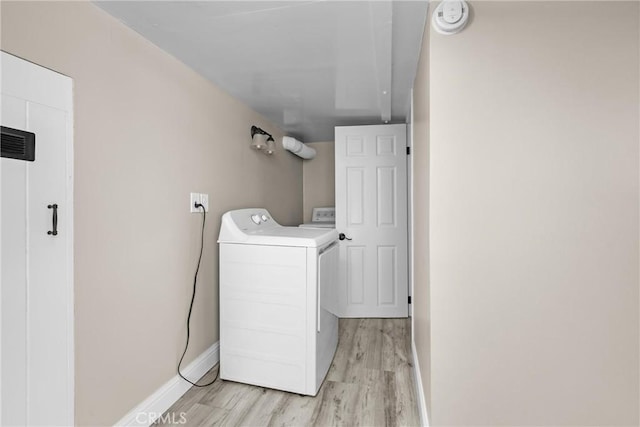 540 Avalon St, Morro Bay, CA 93442 - laundry area with separate washer and dryer, light wood-style floors, and baseboards