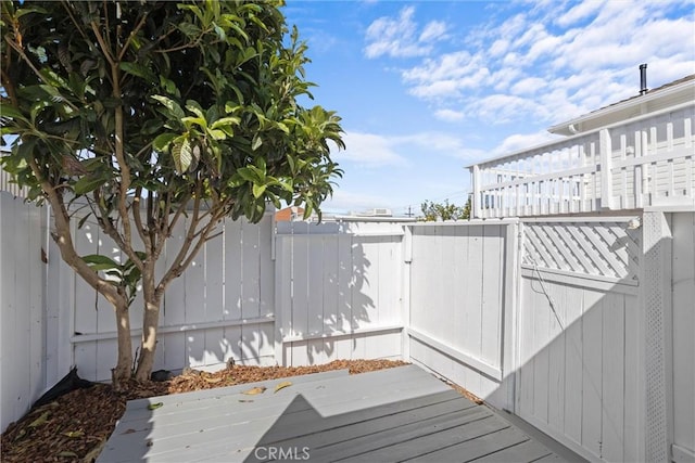 540 Avalon St, Morro Bay, CA 93442 - wooden terrace with a fenced backyard