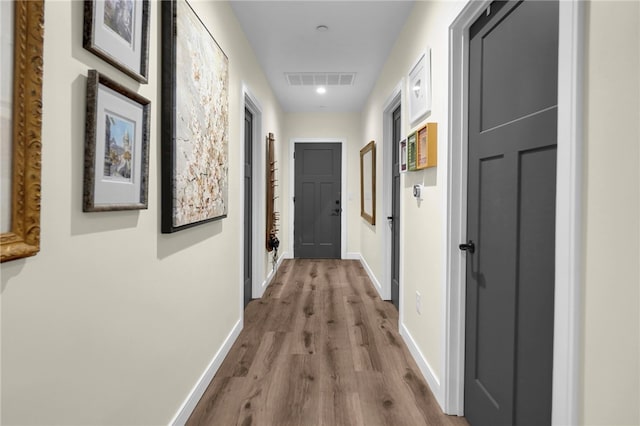 424 E Angeleno Ave, San Gabriel, CA 91776 - corridor with dark wood-style floors and baseboards