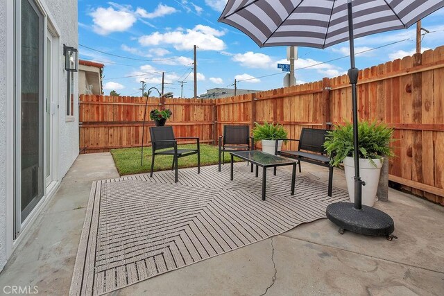 view of patio / terrace with fence