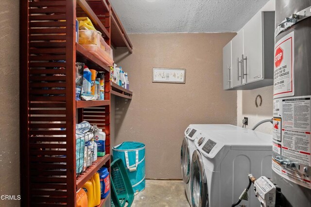 1037 Cortina Ct, Orland, CA 95963 - washroom with water heater, cabinet space, washing machine and clothes dryer, a textured ceiling, and a textured wall
