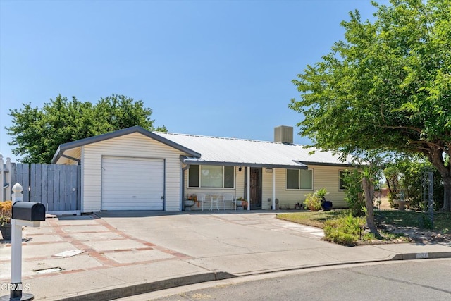 1037 Cortina Ct, Orland, CA 95963 - single story home featuring concrete driveway, a garage, and metal roof
