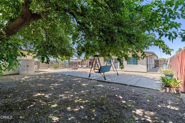 1037 Cortina Ct, Orland, CA 95963 - view of jungle gym featuring a patio area