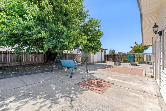 1037 Cortina Ct, Orland, CA 95963 - fenced backyard featuring a patio area