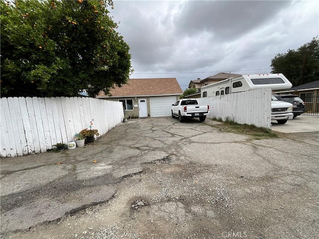 4320 Rio Hondo Ave, Rosemead, CA 91770 - view of home's exterior featuring driveway, fence, a garage, and an outbuilding