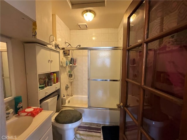 4320 Rio Hondo Ave, Rosemead, CA 91770 - full bathroom with bath / shower combo with glass door, toilet, and vanity