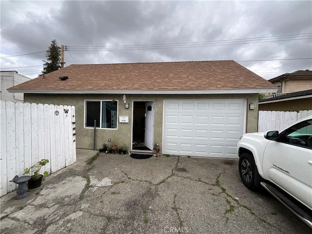 4320 Rio Hondo Ave, Rosemead, CA 91770 - ranch-style house featuring driveway, fence, a shingled roof, and a garage