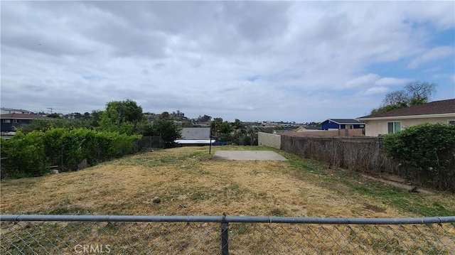 view of yard featuring fence