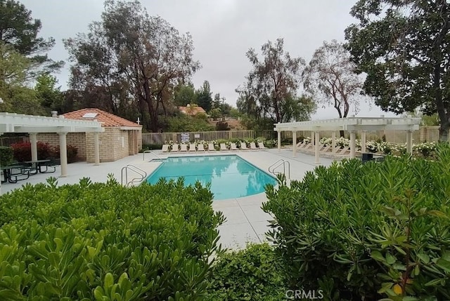22000 Jodi Pl, Saugus, CA 91350 - community pool with a pergola and a patio area