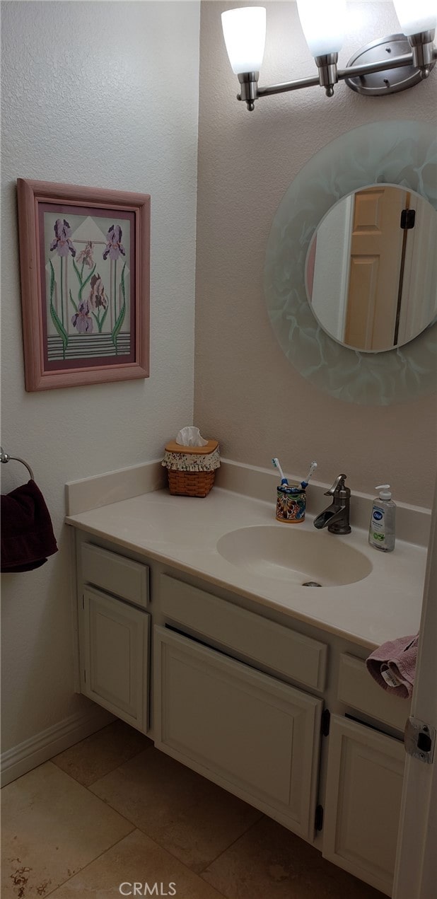 22000 Jodi Pl, Saugus, CA 91350 - bathroom featuring vanity and tile patterned flooring