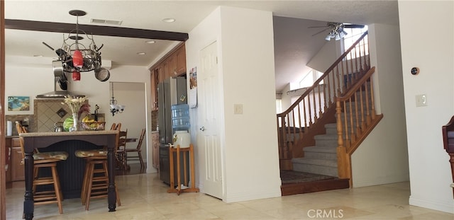 22000 Jodi Pl, Saugus, CA 91350 - kitchen with ceiling fan, recessed lighting, and a breakfast bar area