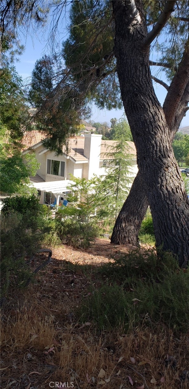 22000 Jodi Pl, Saugus, CA 91350 - view of property exterior featuring stucco siding