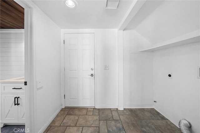 39812 Barcelona, Murrieta, CA 92562 - laundry area with electric dryer hookup, stone finish flooring, and baseboards
