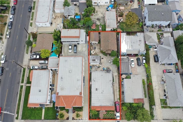 aerial perspective of suburban area with property parcel outlined