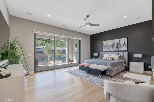 bedroom featuring access to exterior, wood finished floors, recessed lighting, baseboards, and a ceiling fan