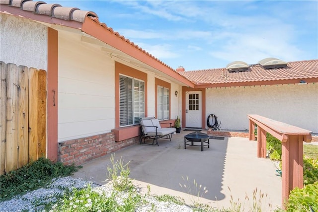 23867 Gamma St, Moreno Valley, CA 92553 - view of patio / terrace with a fire pit and fence