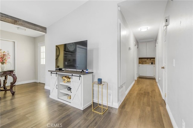 23867 Gamma St, Moreno Valley, CA 92553 - hallway featuring wood finished floors and baseboards