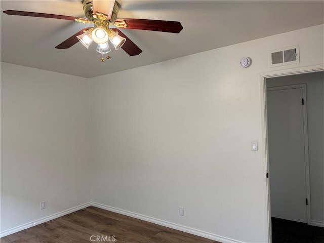 241 N 16th St N, Montebello, CA 90640 - unfurnished room featuring a ceiling fan, baseboards, and dark wood-type flooring