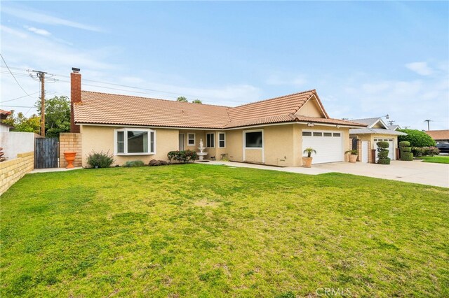 6329 Fillmore Ave, Rialto, CA 92377 - ranch-style home with stucco siding, a garage, concrete driveway, and a chimney