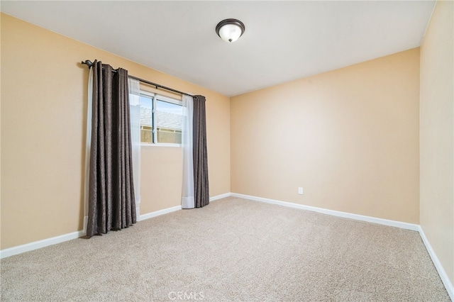 6329 Fillmore Ave, Rialto, CA 92377 - carpeted empty room with baseboards