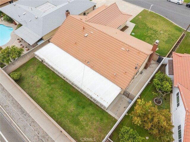 6329 Fillmore Ave, Rialto, CA 92377 - aerial view of property and surrounding area featuring a pool