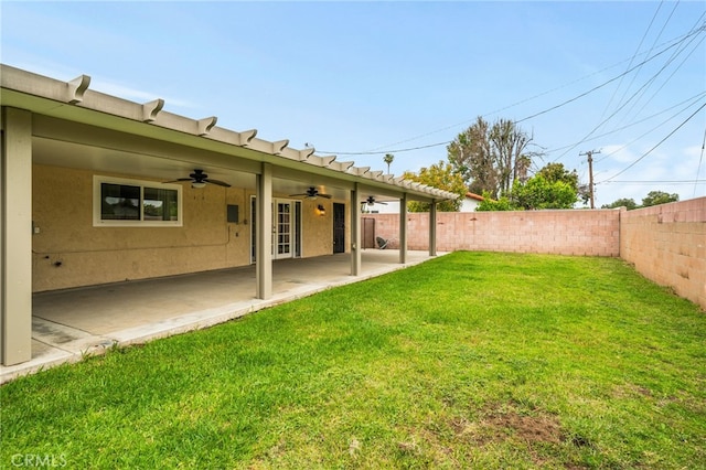 6329 Fillmore Ave, Rialto, CA 92377 - view of yard featuring ceiling fan and a patio
