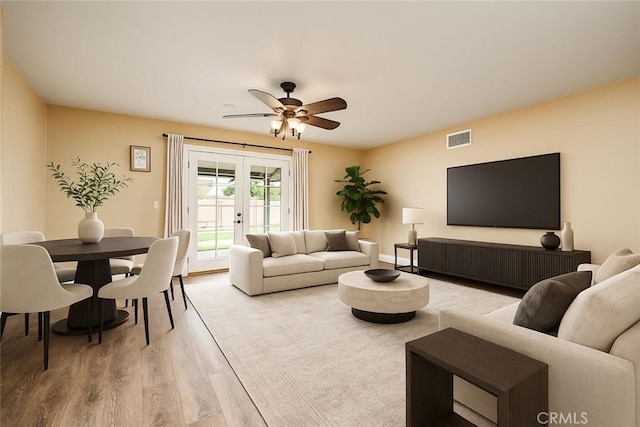 6329 Fillmore Ave, Rialto, CA 92377 - living area with french doors, wood finished floors, and ceiling fan