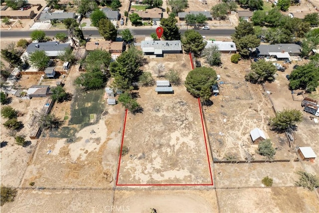 aerial view of residential area with property parcel outlined