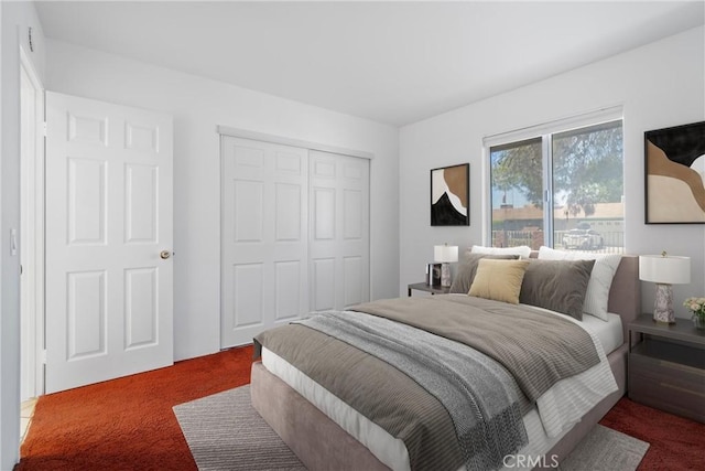 carpeted bedroom with a closet