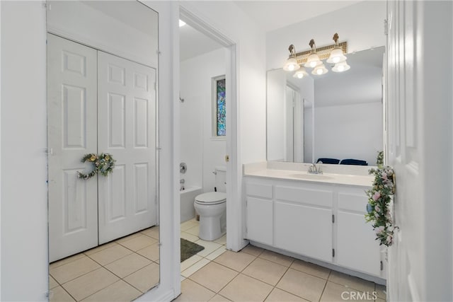 full bath featuring vanity, tile patterned flooring, and toilet