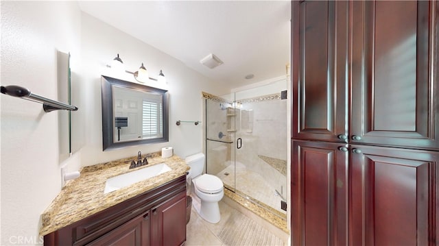279 White Oak Rd, Lake Elsinore, CA 92530 - bathroom featuring toilet, a stall shower, tile patterned flooring, and vanity