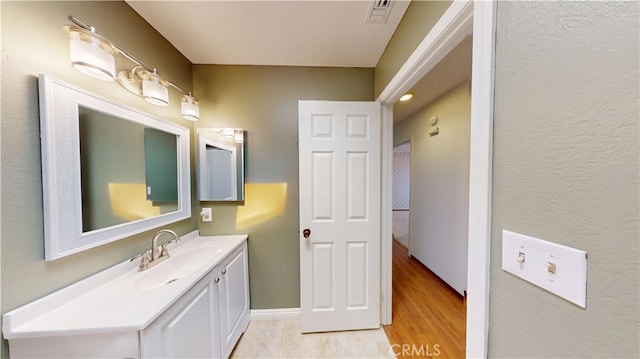279 White Oak Rd, Lake Elsinore, CA 92530 - bathroom featuring vanity and wood finished floors