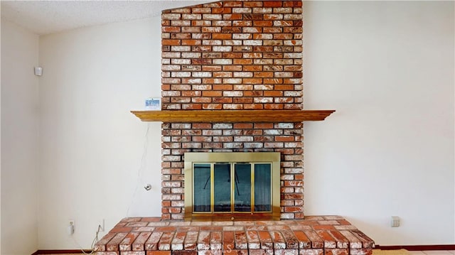 279 White Oak Rd, Lake Elsinore, CA 92530 - detailed view of a fireplace and a textured ceiling