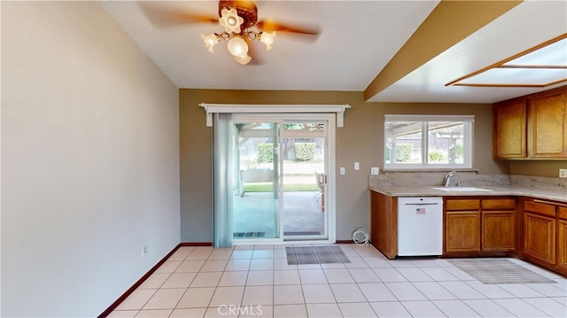 279 White Oak Rd, Lake Elsinore, CA 92530 - kitchen featuring a sink, white dishwasher, light countertops, a ceiling fan, and brown cabinetry