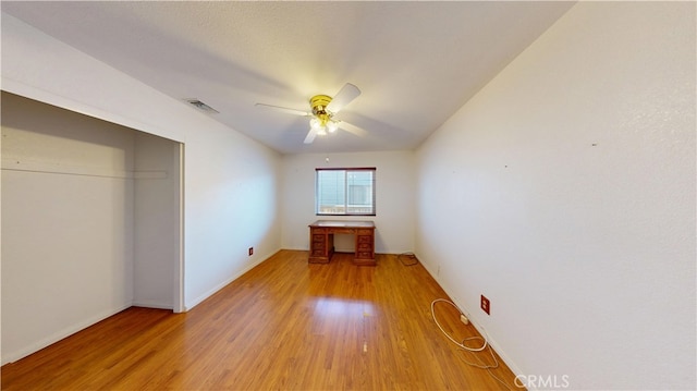 279 White Oak Rd, Lake Elsinore, CA 92530 - unfurnished bedroom featuring light wood-style floors, a closet, baseboards, and a ceiling fan