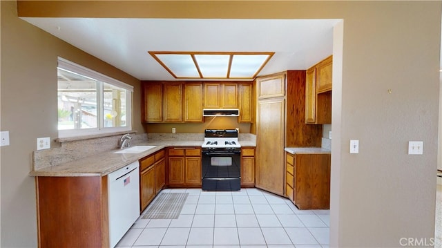 279 White Oak Rd, Lake Elsinore, CA 92530 - kitchen featuring gas range oven, white dishwasher, brown cabinetry, under cabinet range hood, and a sink
