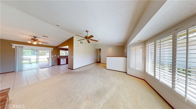 279 White Oak Rd, Lake Elsinore, CA 92530 - unfurnished living room with ceiling fan, lofted ceiling, carpet floors, baseboards, and tile patterned flooring