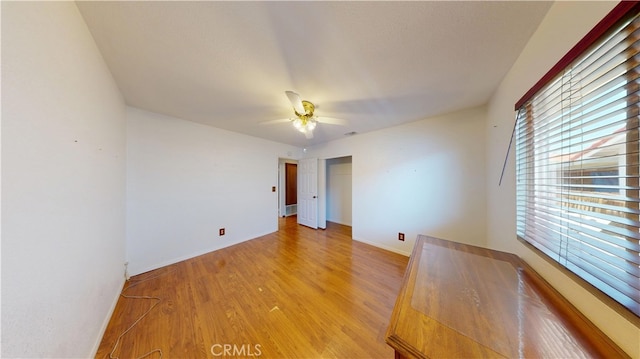 279 White Oak Rd, Lake Elsinore, CA 92530 - spare room featuring light wood-style flooring, ceiling fan, and baseboards