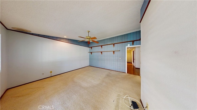 279 White Oak Rd, Lake Elsinore, CA 92530 - unfurnished room featuring a ceiling fan, a textured ceiling, carpet, crown molding, and baseboards
