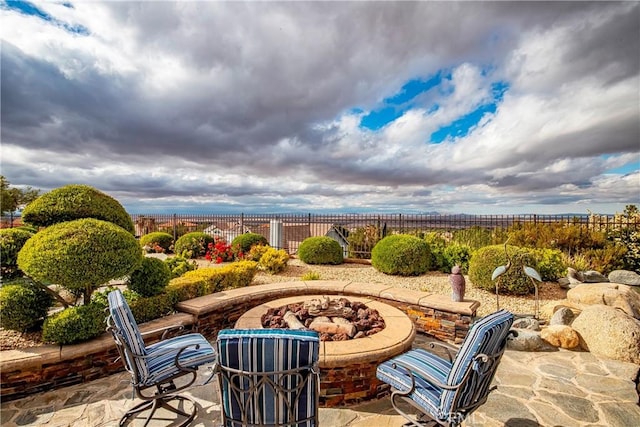 6723 Sycamore Ln, Palmdale, CA 93551 - view of patio with an outdoor fire pit and a fenced backyard