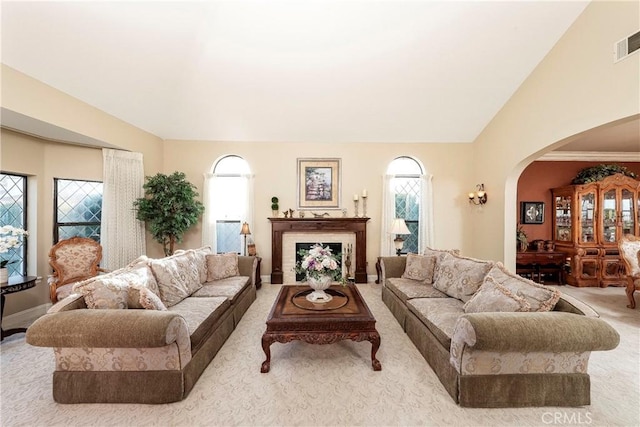 6723 Sycamore Ln, Palmdale, CA 93551 - carpeted living room with arched walkways