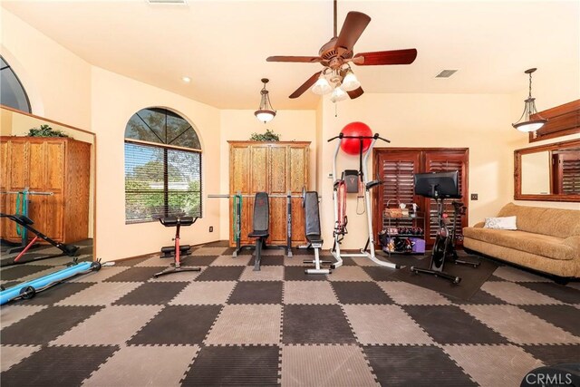6723 Sycamore Ln, Palmdale, CA 93551 - workout room with a ceiling fan and carpet floors