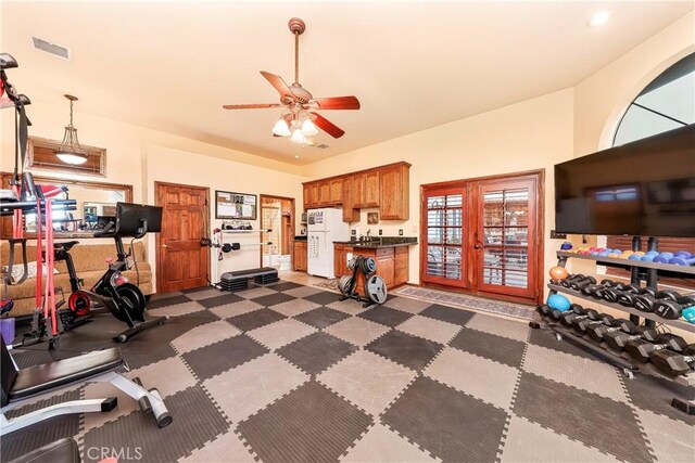 6723 Sycamore Ln, Palmdale, CA 93551 - workout area with french doors and ceiling fan