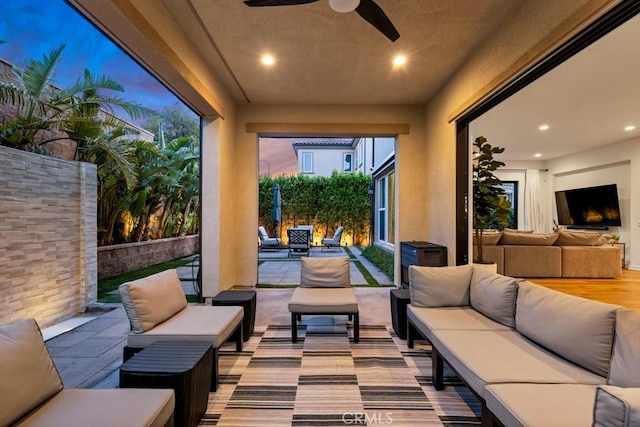 view of patio / terrace featuring outdoor lounge area and ceiling fan